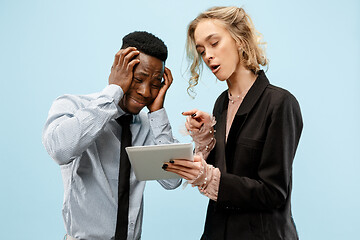 Image showing Serious businesswoman and colleague in the office.