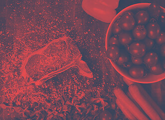 Image showing top view of raw steak on wooden table