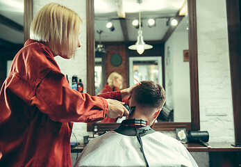 Image showing Client during beard shaving in barber shop