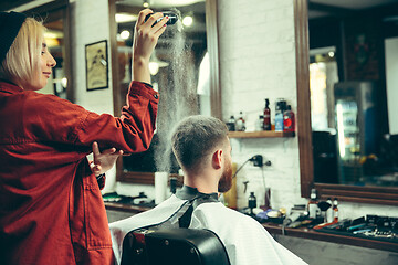 Image showing Client during beard shaving in barber shop