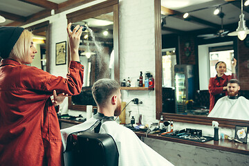 Image showing Client during beard shaving in barber shop