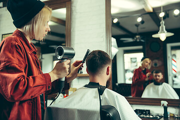 Image showing Client during beard shaving in barber shop