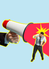 Image showing Business man screaming with a megaphone