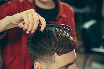 Image showing Client during beard shaving in barber shop