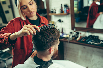 Image showing Client during beard shaving in barber shop