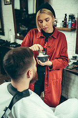 Image showing Client during beard shaving in barber shop