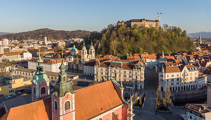 Image showing Aerial drone panoramic view of Ljubljana, capital of Slovenia in warm afternoon sun