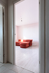 Image showing Entrance to an empty bedroom with an old sofa