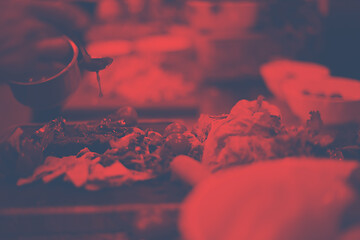 Image showing Chef hand finishing steak meat plate