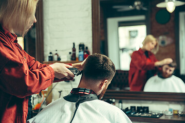 Image showing Client during beard shaving in barber shop