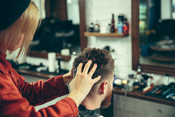 Image showing Client during beard shaving in barber shop