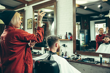 Image showing Client during beard shaving in barber shop