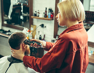 Image showing Client during beard shaving in barber shop