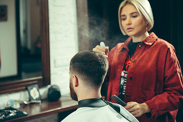 Image showing Client during beard shaving in barber shop