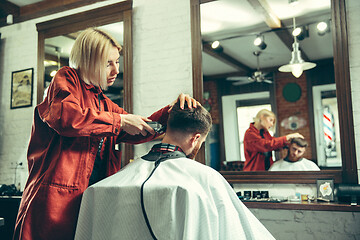 Image showing Client during beard shaving in barber shop