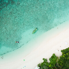 Image showing Aerial drone view of picture perfect beach and turquoise lagoon on small tropical island on Maldives