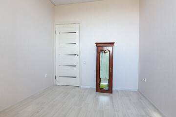 Image showing The interior of an empty room prepared for moving to another apartment