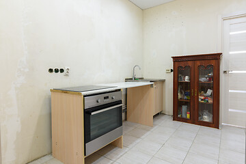 Image showing The interior of a budget temporary kitchen, assembled during the renovation of the apartment