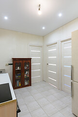 Image showing Interior of a new living room kitchen with temporary furniture in a new building