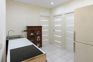 Image showing Kitchen interior with temporary poor furniture in a new building