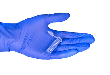 Image showing Test tube in hand in gloves isolated on white