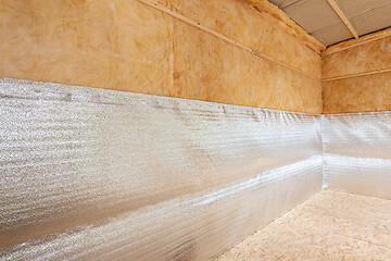 Image showing Thermal insulation of a country house from reflective foamed polyethylene laminated with lavsan for house insulation