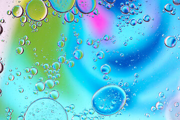 Image showing Defocused multicolored abstract background picture made with oil, water and soap with mooving boubbles