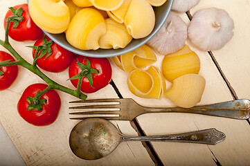 Image showing Italian snail lumaconi pasta with tomatoes