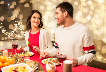 Image showing happy couple eating at christmas dinner