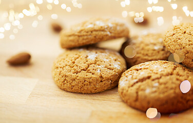 Image showing close up of oatmeal cookies on wooden table