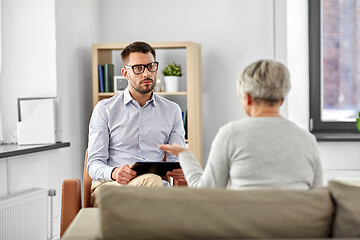 Image showing psychologist listening to senior woman patient