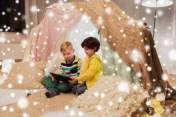 Image showing little boys with tablet pc in kids tent at home