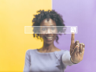 Image showing Woman\'s hand with finger on blue background