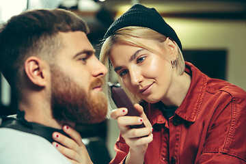 Image showing Client during beard shaving in barber shop