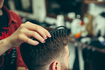 Image showing Client during beard shaving in barber shop