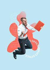 Image showing Happy businessman jumping and holding laptop