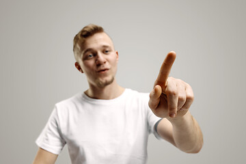 Image showing Businessman hand touching empty virtual screen