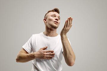 Image showing I kiss you. Portrait of attractive man with kiss on lips