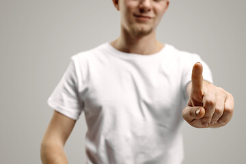 Image showing Businessman hand touching empty virtual screen