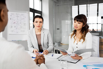 Image showing recruiters having job interview with employee