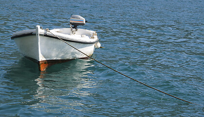 Image showing Small sea boat achored in the bay