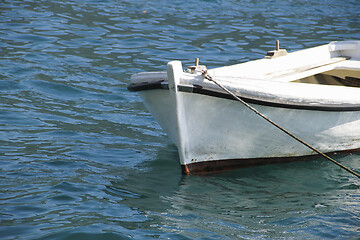 Image showing Small sea boat achored in the bay