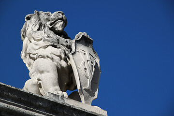 Image showing Stone lion with shield