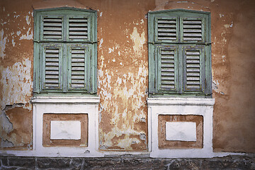 Image showing green wooden shutters close up