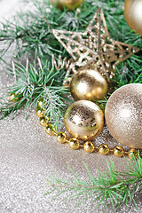 Image showing Christmas decorations and evergreen fir tree branch.