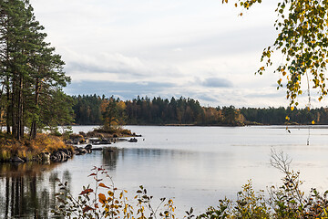 Image showing Calm lake view with autumn colors