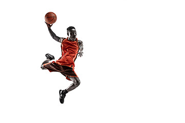 Image showing Full length portrait of a basketball player with ball