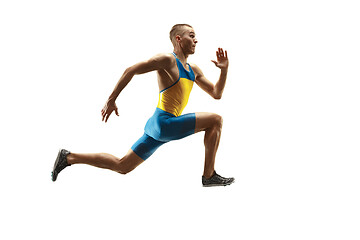 Image showing Young caucasian man running or jogging isolated on white studio background.