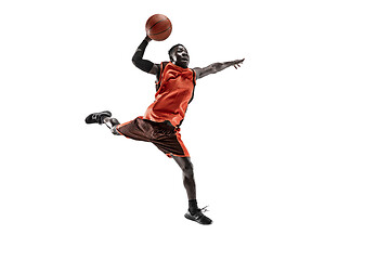 Image showing Full length portrait of a basketball player with ball