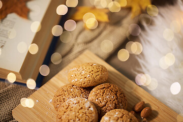 Image showing oatmeal cookies on wooden board at home